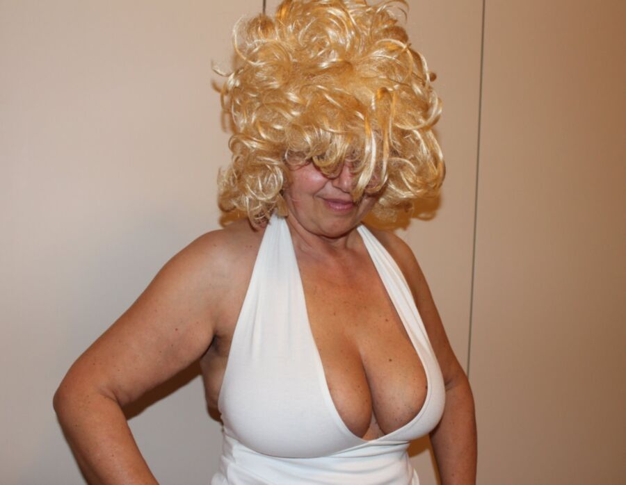 Free porn pics of Blonde Wig Sexy Shy Gilf Gorgeous Big Fuckable Tits 12 of 50 pics