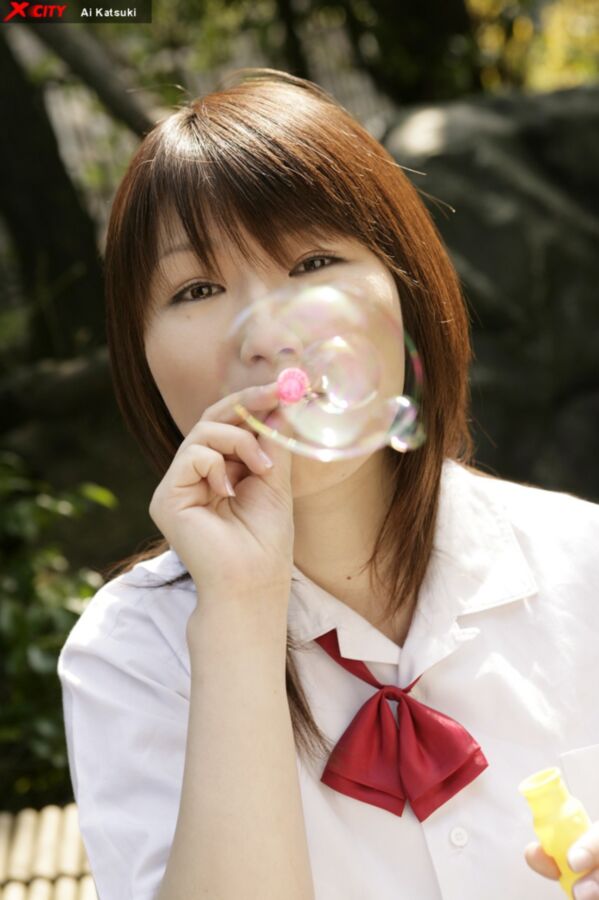 Japanese school girl Ai Katsuki strips out of her uniform 2 of 12 pics